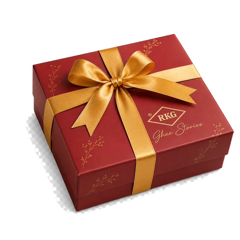 RKG Ghee Stories closed maroon gift box with gold ribbon