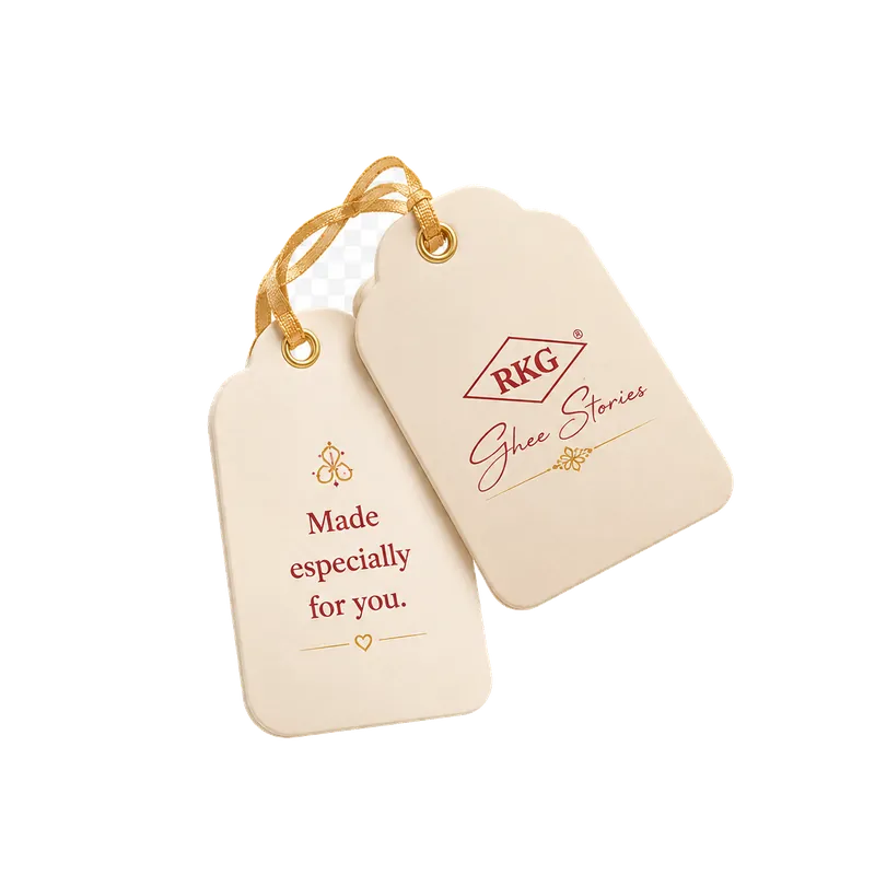 Two cream RKG gift tags on gold ribbon